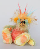 Salsa Verde is a very happy and colourful little one of a kind, hand dyed mohair and faux fur artist bear by Barbara-Ann Bears, he stands 6.5 inches/16 cm tall. Salsa Verde is made from hand dyed mohair, with long plumes of faux fur on his head, hand painted eyes, a multicoloured nose and a beaming smile, a happy bear!