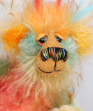 Salsa Verde has beautiful, hand painted eyes with eyelids, a splendid nose embroidered from individual threads to compliment his colouring and he has a huge, friendly smile.