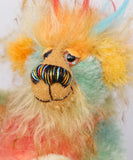 Salsa Verde has beautiful, hand painted eyes with eyelids, a splendid nose embroidered from individual threads to compliment his colouring and he has a huge, friendly smile.