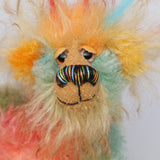 Salsa Verde has beautiful, hand painted eyes with eyelids, a splendid nose embroidered from individual threads to compliment his colouring and he has a huge, friendly smile.