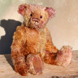 Thomas Muldoon, a traditional, one of a kind artist teddy bear, in fabulous hand dyed mohair by Barbara Ann Bears, he stands 15 inches/38cm tall and is 10.5 inches/27cm sitting. He's made from German mohair hand-dyed in many natural shades, there are several shades of copper, cinnamon, beige, gold, rose and magenta