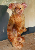 Thomas Muldoon, a traditional, one of a kind artist teddy bear, in fabulous hand dyed mohair by Barbara Ann Bears, he stands 15 inches/38cm tall and is 10.5 inches/27cm sitting. He's made from German mohair hand-dyed in many natural shades, there are several shades of copper, cinnamon, beige, gold, rose and magenta