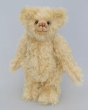 Duncan a one of a kind, traditional mohair artist teddy bear by Barbara-Ann Bears. He stands 11 inches (28cm) tall and is 8 inches (20cm) sitting. He is made from a dense wavy blonde German mohair with wool felt paw pads.  Walter is from the design we used to make Marigold's teddy bear for the TV series Downton