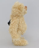 Duncan a one of a kind, traditional mohair artist teddy bear by Barbara-Ann Bears. He stands 11 inches (28cm) tall and is 8 inches (20cm) sitting. He is made from a dense wavy blonde German mohair with wool felt paw pads.  Walter is from the design we used to make Marigold's teddy bear for the TV series Downton