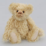 Duncan a one of a kind, traditional mohair artist teddy bear by Barbara-Ann Bears. He stands 11 inches (28cm) tall and is 8 inches (20cm) sitting. He is made from a dense wavy blonde German mohair with wool felt paw pads.  Walter is from the design we used to make Marigold's teddy bear for the TV series Downton