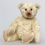 Warburton is a very sweet and loving classical, traditional mohair artist teddy bear by Barbara Ann Bears, he is 17 inches (43cm) tall and is 13 inches (33cm) sitting. Warburton is made from distressed creamy white mohair with beige wool felt paw pads, reproduction black boot button eyes and an embroidered brown nose