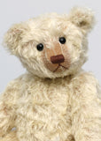 Warburton is a very sweet and loving classical, traditional mohair artist teddy bear by Barbara Ann Bears, he is 17 inches (43cm) tall and is 13 inches (33cm) sitting. Warburton is made from distressed creamy white mohair with beige wool felt paw pads, reproduction black boot button eyes and an embroidered brown nose