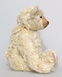 Warburton is a very sweet and loving classical, traditional mohair artist teddy bear by Barbara Ann Bears, he is 17 inches (43cm) tall and is 13 inches (33cm) sitting. Warburton is made from distressed creamy white mohair with beige wool felt paw pads, reproduction black boot button eyes and an embroidered brown nose