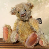 Wee Jimmy is a very handsome & subtly colourful, traditional, one of a kind artist teddy bear, in hand dyed mohair by Barbara Ann Bears, he stands 8.5 inches (21 cm) tall and is 6 inches (15 cm) sitting. He is made from a fairly short and sparse German mohair hand-dyed in natural hues green, gold, umber, blue and grey