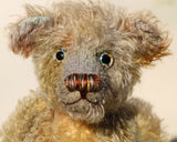 Wee Jimmy is a very handsome & subtly colourful, traditional, one of a kind artist teddy bear, in hand dyed mohair by Barbara Ann Bears, he stands 8.5 inches (21 cm) tall and is 6 inches (15 cm) sitting. He is made from a fairly short and sparse German mohair hand-dyed in natural hues green, gold, umber, blue and grey