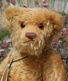 Wilfred is made from a wonderful antique gold mohair, it is a medium length, and a little fluffy and distressed, it's not a type of mohair that is made anymore which makes him just that little bit extra special. Wilfred has gorgeous amber glass eyes, a splendid, carefully embroidered brown nose and a relaxed and demure expression. Wilfred was the first of our bears to have a beard, we were about to trim it off but thought it rather suited him