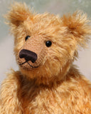 William is an elegant and charming, classical, one of a kind, traditional artist teddy bear by Barbara Ann Bears, he stands 14 inches/36cm tall and is 10 inches/26 cm sitting. William is made from a beautiful, slightly sparse, fairly long, feathery, strawberry blonde coloured German mohair