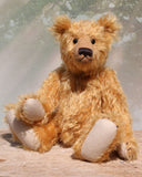 William is an elegant and charming, classical, one of a kind, traditional artist teddy bear by Barbara Ann Bears, he stands 14 inches/36cm tall and is 10 inches/26 cm sitting. William is made from a beautiful, slightly sparse, fairly long, feathery, strawberry blonde coloured German mohair