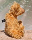 William is an elegant and charming, classical, one of a kind, traditional artist teddy bear by Barbara Ann Bears, he stands 14 inches/36cm tall and is 10 inches/26 cm sitting. William is made from a beautiful, slightly sparse, fairly long, feathery, strawberry blonde coloured German mohair
