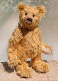William is an elegant and charming, classical, one of a kind, traditional artist teddy bear by Barbara Ann Bears, he stands 14 inches/36cm tall and is 10 inches/26 cm sitting. William is made from a beautiful, slightly sparse, fairly long, feathery, strawberry blonde coloured German mohair