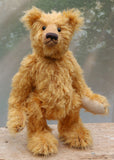 William is an elegant and charming, classical, one of a kind, traditional artist teddy bear by Barbara Ann Bears, he stands 14 inches/36cm tall and is 10 inches/26 cm sitting. William is made from a beautiful, slightly sparse, fairly long, feathery, strawberry blonde coloured German mohair