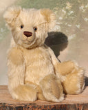 Willoughby is a sweet and cuddly, traditional one of a kind, artist teddy bear made in splendid German mohair by Barbara Ann Bears, he stands 18.5 inches (47cm) tall and is 13.5 inches (34cm) sitting. He is made from dense, blond, straight pile, German mohair with beige wool-felt paw pads & hand painted beautiful eyes