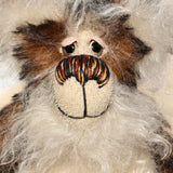 Woody is a very friendly and cuddly one of a kind, artist bear by Barbara-Ann Bears in wonderful fluffy tipped mohair Woody stands 9 inches(23 cm) tall and is 7 inches(18 cm) sitting.   Woody is a very happy and cuddly teddy bear. He's so fluffy that he could almost trip over his own fur
