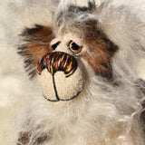 Woody is a very friendly and cuddly one of a kind, artist bear by Barbara-Ann Bears in wonderful fluffy tipped mohair Woody stands 9 inches(23 cm) tall and is 7 inches(18 cm) sitting.   Woody is a very happy and cuddly teddy bear. He's so fluffy that he could almost trip over his own fur