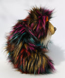 Yolaf Yeti-Boogie, an exceedingly vibrant, happy and colourful, one of a kind, artist yeti-bear in faux fur & mohair by Barbara-Ann Bears Yolaf Yeti-Boogie stands 13.5 inches (34 cm) tall and is 11 inches (28 cm) sitting.