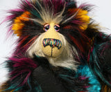 Yolaf Yeti-Boogie, an exceedingly vibrant, happy and colourful, one of a kind, artist yeti-bear in faux fur & mohair by Barbara-Ann Bears Yolaf Yeti-Boogie stands 13.5 inches (34 cm) tall and is 11 inches (28 cm) sitting.