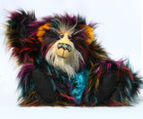 Yolaf Yeti-Boogie, an exceedingly vibrant, happy and colourful, one of a kind, artist yeti-bear in faux fur & mohair by Barbara-Ann Bears Yolaf Yeti-Boogie stands 13.5 inches (34 cm) tall and is 11 inches (28 cm) sitting.
