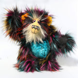 Yolaf Yeti-Boogie, an exceedingly vibrant, happy and colourful, one of a kind, artist yeti-bear in faux fur & mohair by Barbara-Ann Bears Yolaf Yeti-Boogie stands 13.5 inches (34 cm) tall and is 11 inches (28 cm) sitting.