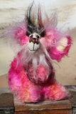 Yummy YumYum is a comical, fabulously pink, one of a kind, artist bear in beautiful hand dyed mohair and faux fur by Barbara-Ann Bears. Yummy YumYum stands 7.5 inches (19 cm) tall and is 6 inches (15 cm) sitting, this doesn't include her wild hair which adds another 3 inches (7.5 cm) to those measurements.