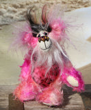 Yummy YumYum is a comical, fabulously pink, one of a kind, artist bear in beautiful hand dyed mohair and faux fur by Barbara-Ann Bears. Yummy YumYum stands 7.5 inches (19 cm) tall and is 6 inches (15 cm) sitting, this doesn't include her wild hair which adds another 3 inches (7.5 cm) to those measurements.
