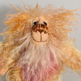 He has beautiful, hand painted eyes with hand coloured eyelids, a splendid little nose embroidered from individual threads to compliment his colouring and he has a sweet, friendly smile. Ziggy Scrumdumpling could be your perfect bear, he's very happy and is small enough to fit in your pocket and travel around with you. He will always be very with a twinkle in his eye and that happy smile whenever you need it.