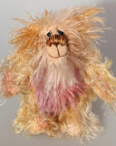 Ziggy Scrumdumpling a lovable, colourful, little one of a kind, hand dyed mohair artist bear by Barbara-Ann Bears, he is one of our smallest bears, he stands just 5.5 inches/14 cm tall and is 4.5 inches/11 cm sitting. He's mainly a scruffy sparse mohair which Barbara has dyed in delicate shades of beige, cream and peach