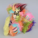 Zoiks! is a rather colourful and comical one of a kind artist bear in beautiful, fluffy hand dyed mohair and faux fur by Barbara Ann Bears. Zoiks! stands 10.5 inches( 33 cm) tall and is 8 inches (20 cm) sitting, this doesn't include his plumes of hair which add another 3 inches/ 7.5cm.