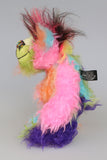 Zoiks! is a rather colourful and comical one of a kind artist bear in beautiful, fluffy hand dyed mohair and faux fur by Barbara Ann Bears. Zoiks! stands 10.5 inches( 33 cm) tall and is 8 inches (20 cm) sitting, this doesn't include his plumes of hair which add another 3 inches/ 7.5cm.