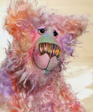 Cezanne is a gentle, elegant and delicately colourful, one of a kind, hand dyed mohair, shaggy artist bear by Barbara-Ann Bears. Cezanne stands 16.5 inches (40 cm) tall and is 12 inches (30 cm) sitting.
