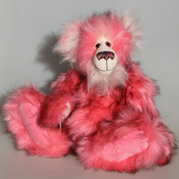 Azalea is an exceedingly cuddly, pink and fluffy, one of a kind, artist bear by Barbara-Ann Bears in luxurious mohair and faux fur, she stands 16.5 inches/42 cm.  Azalea is made from a long, dense and soft faux fur which is a pink with subtle black tipping. Her face, the fronts of her ears and the underside of her tail are a very long and fluffy white mohair. Azalea's pink velvet paw pads complement her mohair perfectly.