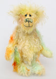 Benjamin Bloom is a wonderfully happy and gorgeously green and yellow one of a kind artist teddy bear by Barbara-Ann Bears he stands 10 inches/25cm tall Benjamin is made from yellow, green and orange long and fluffy hand dyed mohair, with matching hand dyed paw pads, hand painted eyes and a beautifully embroidered nose