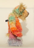 Bossa Nova standing in profile, Bossa Nova is a 21 inch colourful, one of a kind, artist teddy bear in gorgeous hand dyed mohair by Barbara-Ann Bears