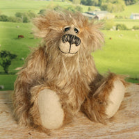 Boswell sitting in the sunshine.
Boswell is a charming and very friendly, one of a kind, artist bear by Barbara-Ann Bears in wonderful flecked grey mohair.
Boswell stands 8 inches/20cm tall