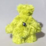 Budgie's back standing, Budgie is a 14 inch, fun-loving and comical, one of a kind, artist bear by Barbara-Ann Bears in luxurious mohair and rather wild lime and rainbow faux fur