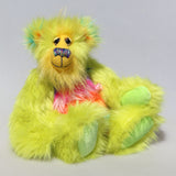 Budgie is a 14 inch, fun-loving and comical, one of a kind, artist bear by Barbara-Ann Bears in luxurious mohair and rather wild lime and rainbow faux fur