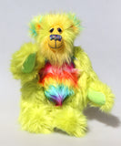 Budgie standing and waving, Budgie is a 14 inch, fun-loving and comical, one of a kind, artist bear by Barbara-Ann Bears in luxurious mohair and rather wild lime and rainbow faux fur