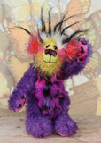 Caramba standing and waving. Caramba is a rather colourful and comical one of a kind artist bear in beautiful purple hand dyed mohair and anmal print faux fur by Barbara Ann Bears