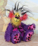 Caramba sitting. Caramba is a rather colourful and comical one of a kind artist bear in beautiful purple hand dyed mohair and anmal print faux fur by Barbara Ann Bears