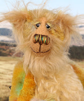 Cardamon's face. 
Cardamon is a gentle, happy teddy bear, a beautifully coloured one of a kind, hand dyed mohair artist bear by Barbara-Ann Bears
Cardamon stands 9.5 inches/24 cm tall cm tall 