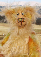 Cardamon's face. 
Cardamon is a gentle, happy teddy bear, a beautifully coloured one of a kind, hand dyed mohair artist bear by Barbara-Ann Bears
Cardamon stands 9.5 inches/24 cm tall cm tall 