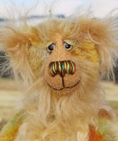 Cardamon's face. 
Cardamon is a gentle, happy teddy bear, a beautifully coloured one of a kind, hand dyed mohair artist bear by Barbara-Ann Bears
Cardamon stands 9.5 inches/24 cm tall cm tall 