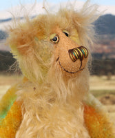 Cardamon's face. 
Cardamon is a gentle, happy teddy bear, a beautifully coloured one of a kind, hand dyed mohair artist bear by Barbara-Ann Bears
Cardamon stands 9.5 inches/24 cm tall cm tall 