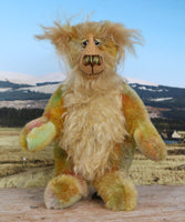 Cardamon standing. 
Cardamon is a gentle, happy teddy bear, a beautifully coloured one of a kind, hand dyed mohair artist bear by Barbara-Ann Bears
Cardamon stands 9.5 inches/24 cm tall cm tall 
