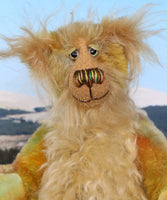 Cardamon's face. 
Cardamon is a gentle, happy teddy bear, a beautifully coloured one of a kind, hand dyed mohair artist bear by Barbara-Ann Bears
Cardamon stands 9.5 inches/24 cm tall cm tall 