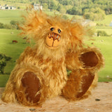 Cardhu sitting and waving, Cardhu is a one of a kind antique gold mohair artist bear with hand painted eyes and a sweet smile